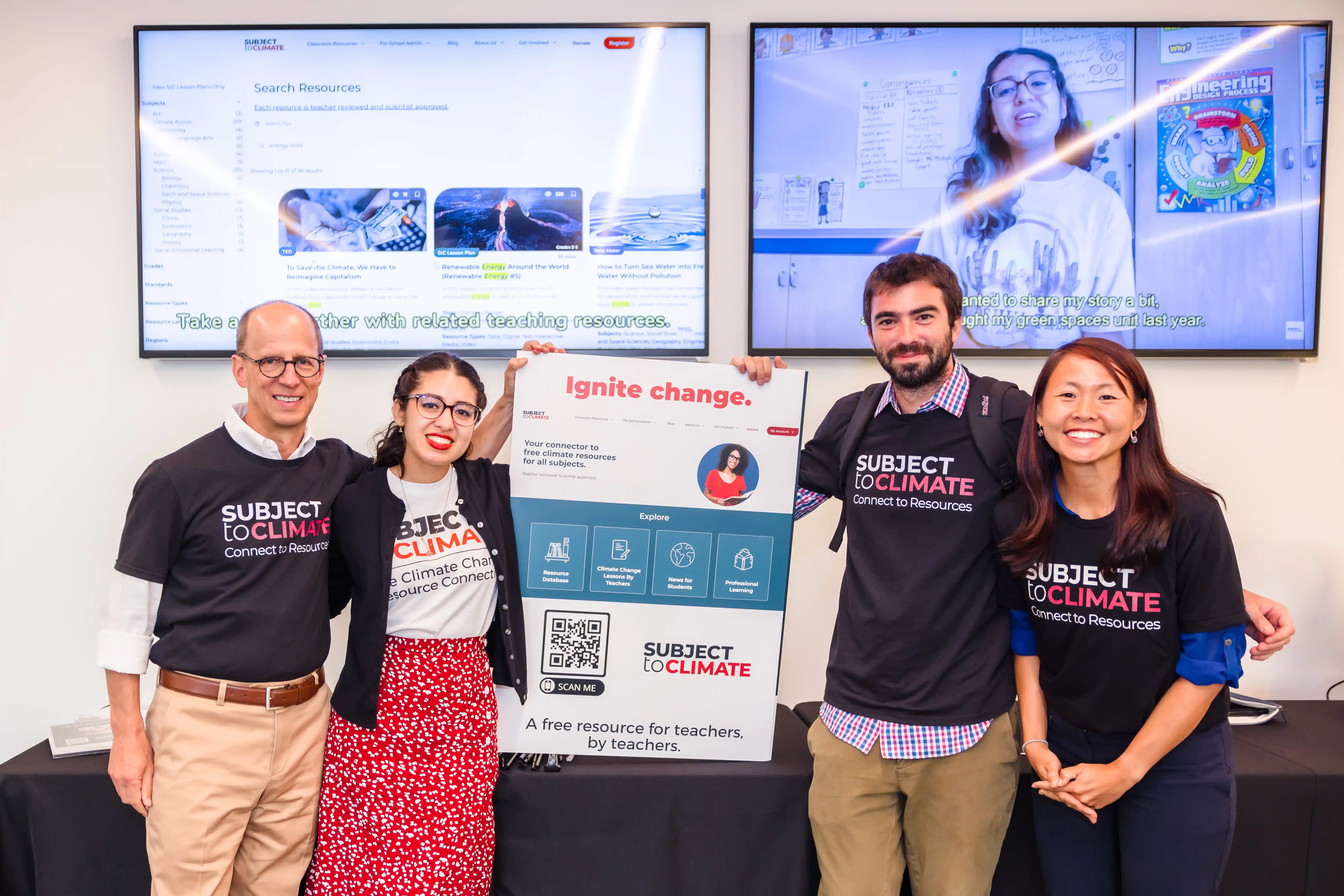 SubjectToClimate team holding an Ignite Change sign